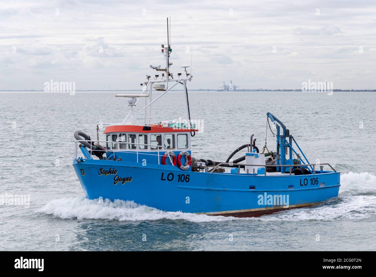 Fishing boat Sophie Jayne heading out to sea from Leigh on Sea, Southend, Essex, UK Stock Photo