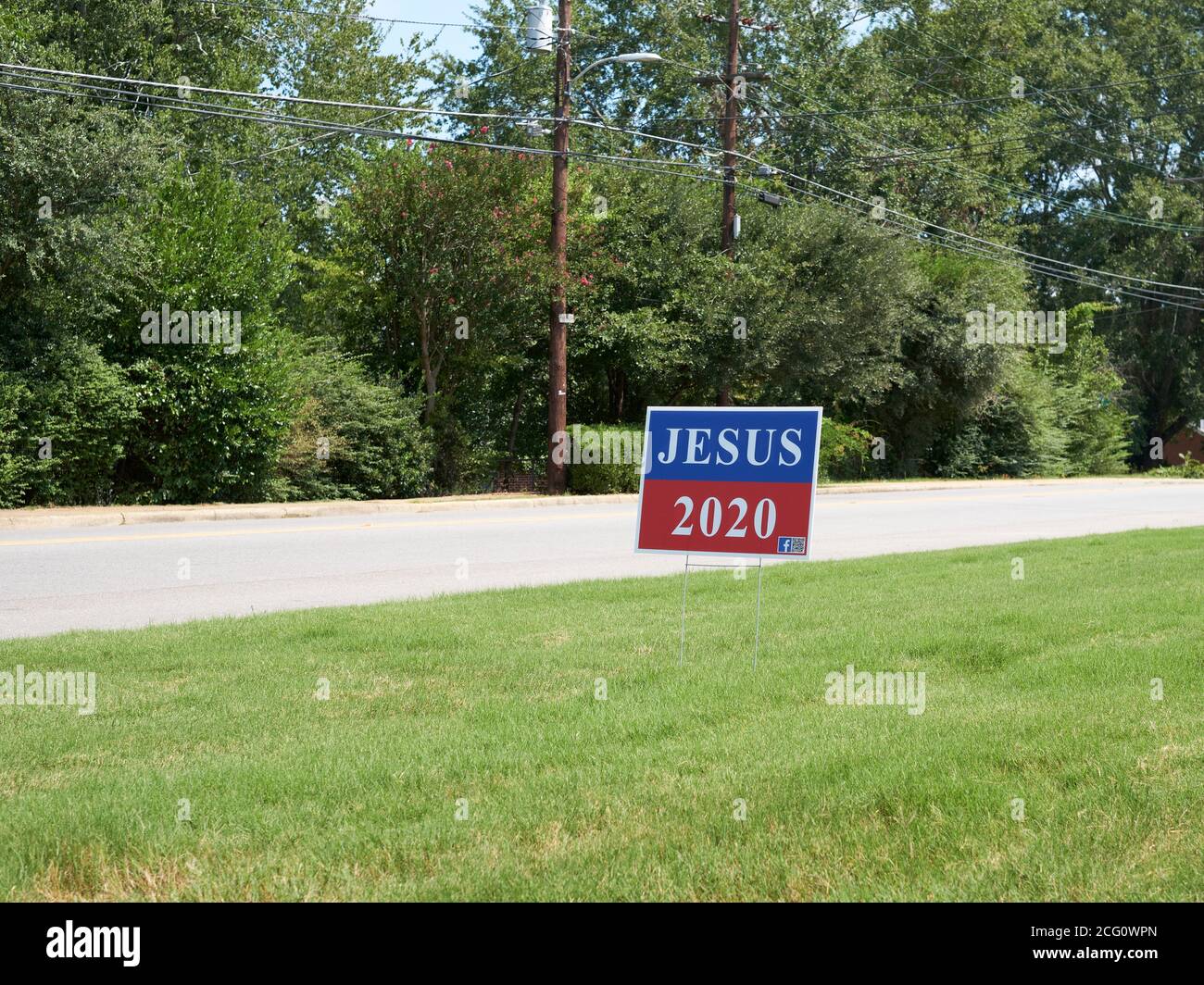 Jesus 2020 election campaign yard sign in the front yard of a local house in Montgomery Alabama, USA. Stock Photo