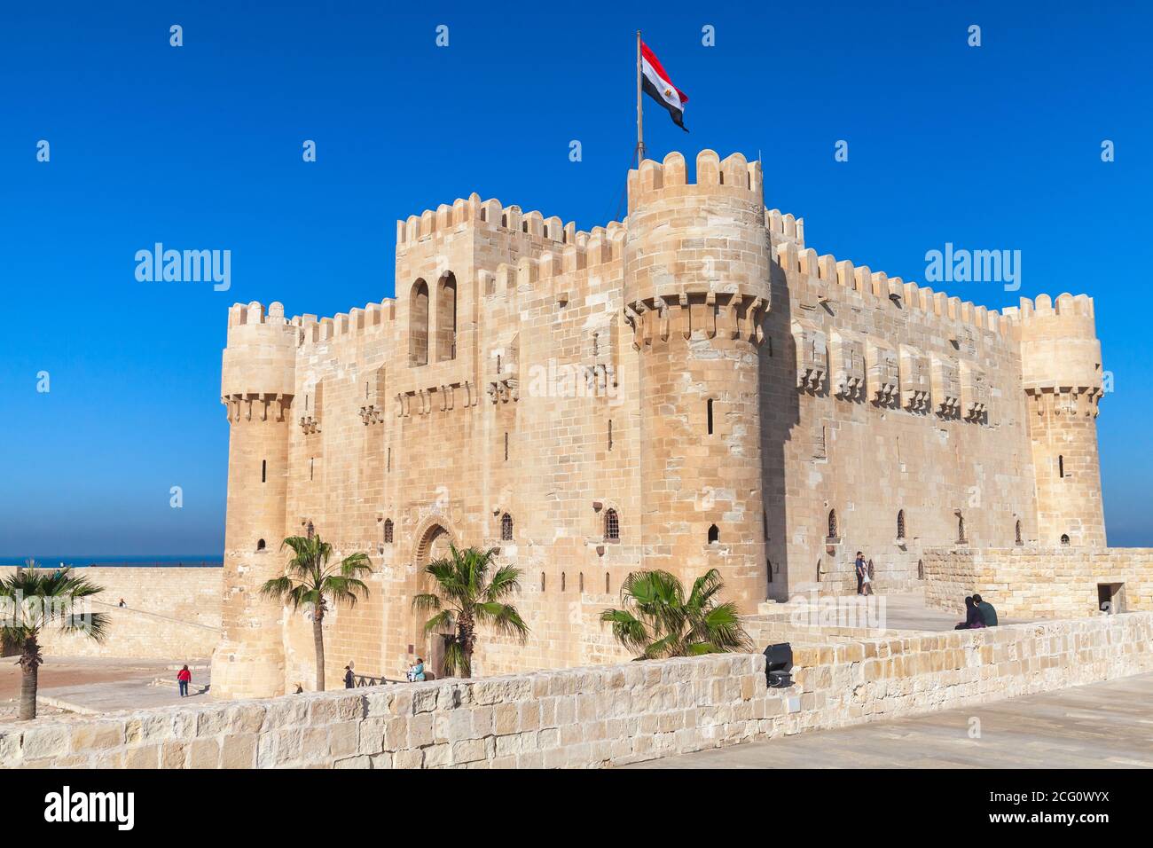 Alexandria, Egypt - December 14, 2018: The Citadel of Qaitbay or the Fort of Qaitbay is a 15th-century defensive fortress located on the Mediterranean Stock Photo