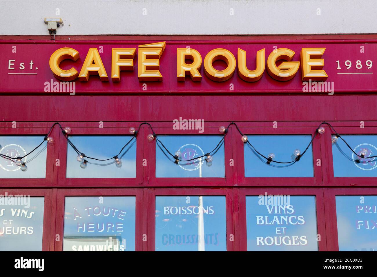 The exterior or facade of a Cafe Rouge Restaurant showing the company logo sign Stock Photo