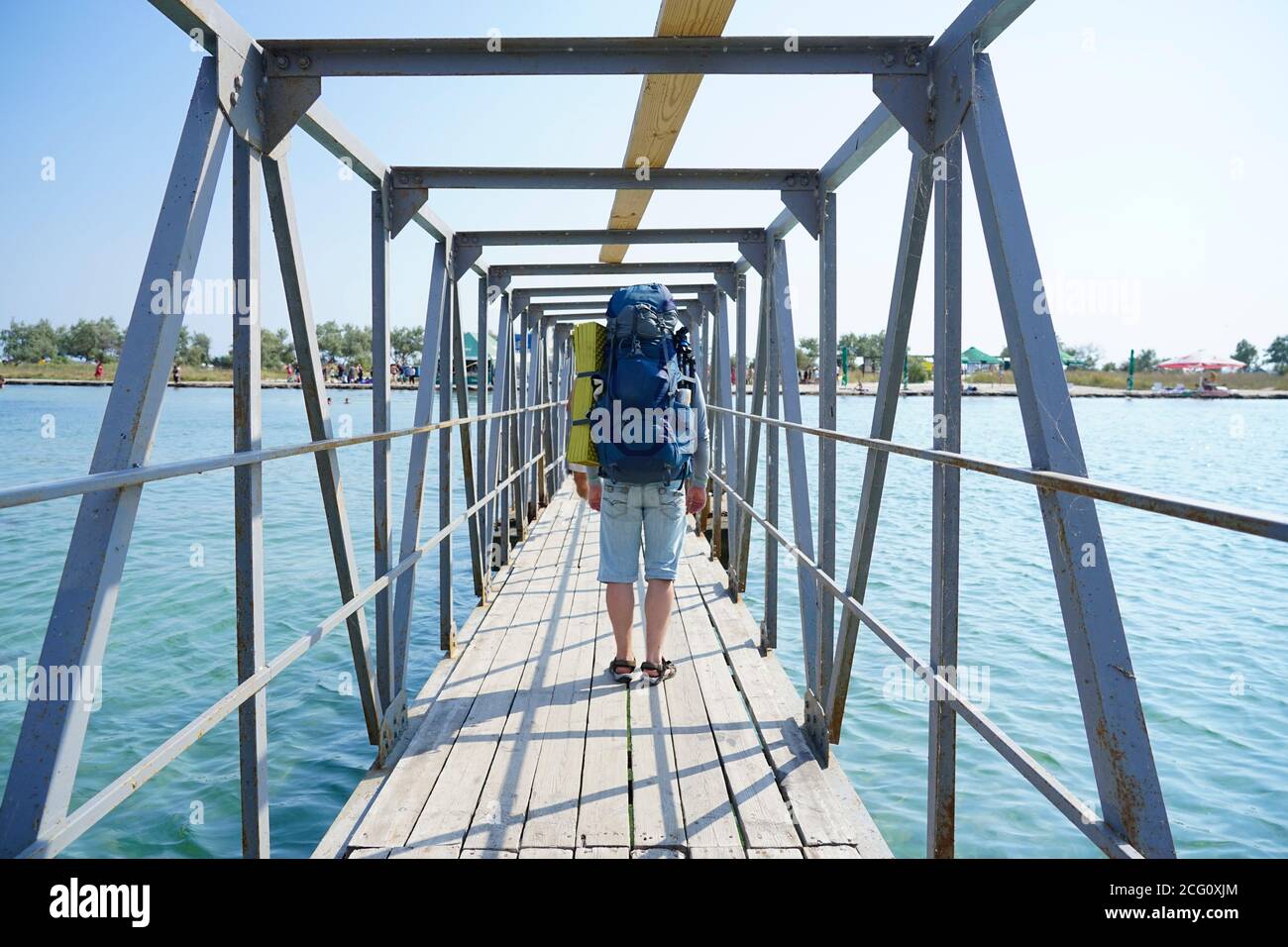 The guy is carrying a big backpack Stock Photo Alamy