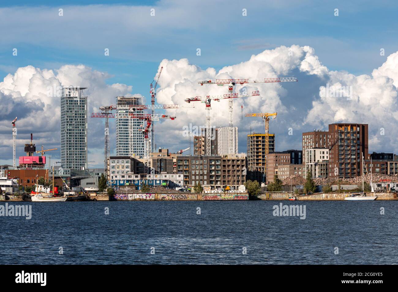 Sompasaari, turning slowly from cargo port to wasteland to modern residential district by sea in Helsinki, Finland Stock Photo