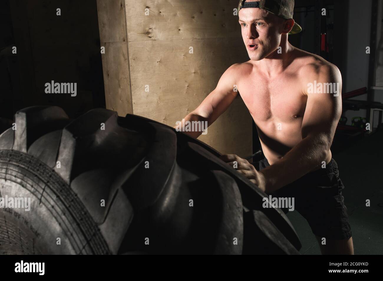 Strong muscular young man flipping hi-res stock photography and images ...