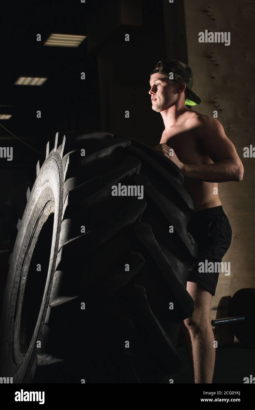 Strong muscular young man flipping hi-res stock photography and images ...