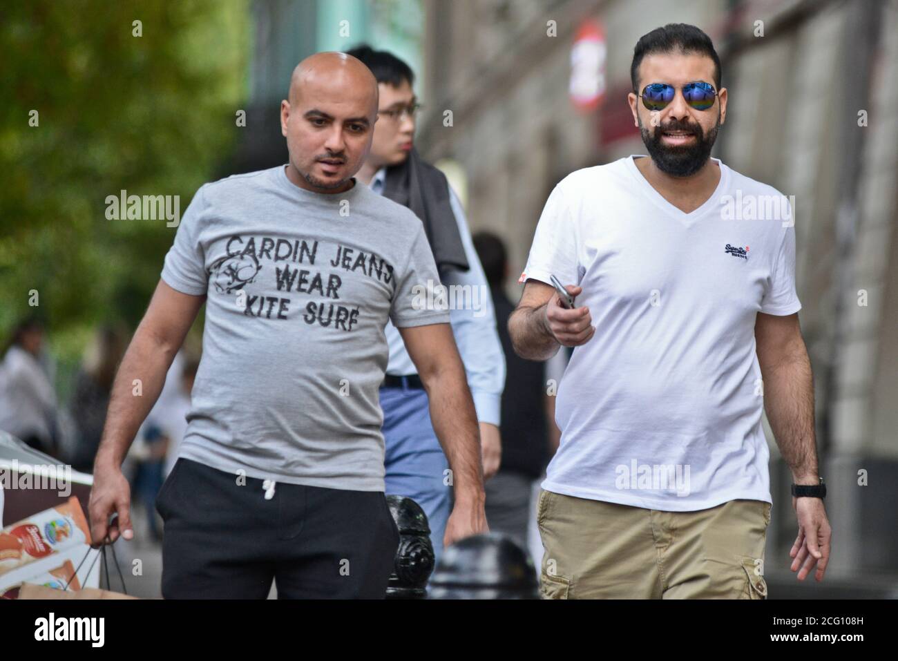 Georgian men walking in Shota Rustaveli Avenue, Tbilisi, Georgia Stock Photo