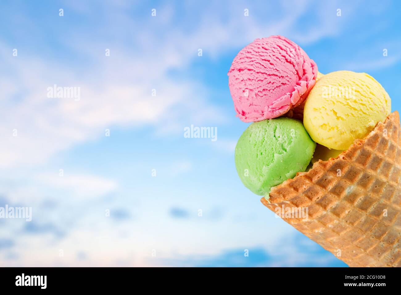 Scoops of ice cream on sky Stock Photo