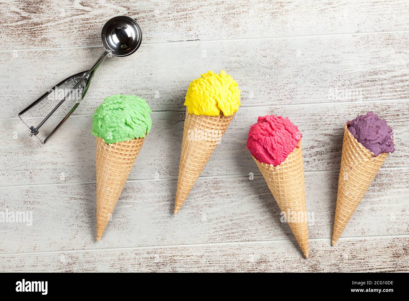 Ice cream cone, on wooden table Stock Photo