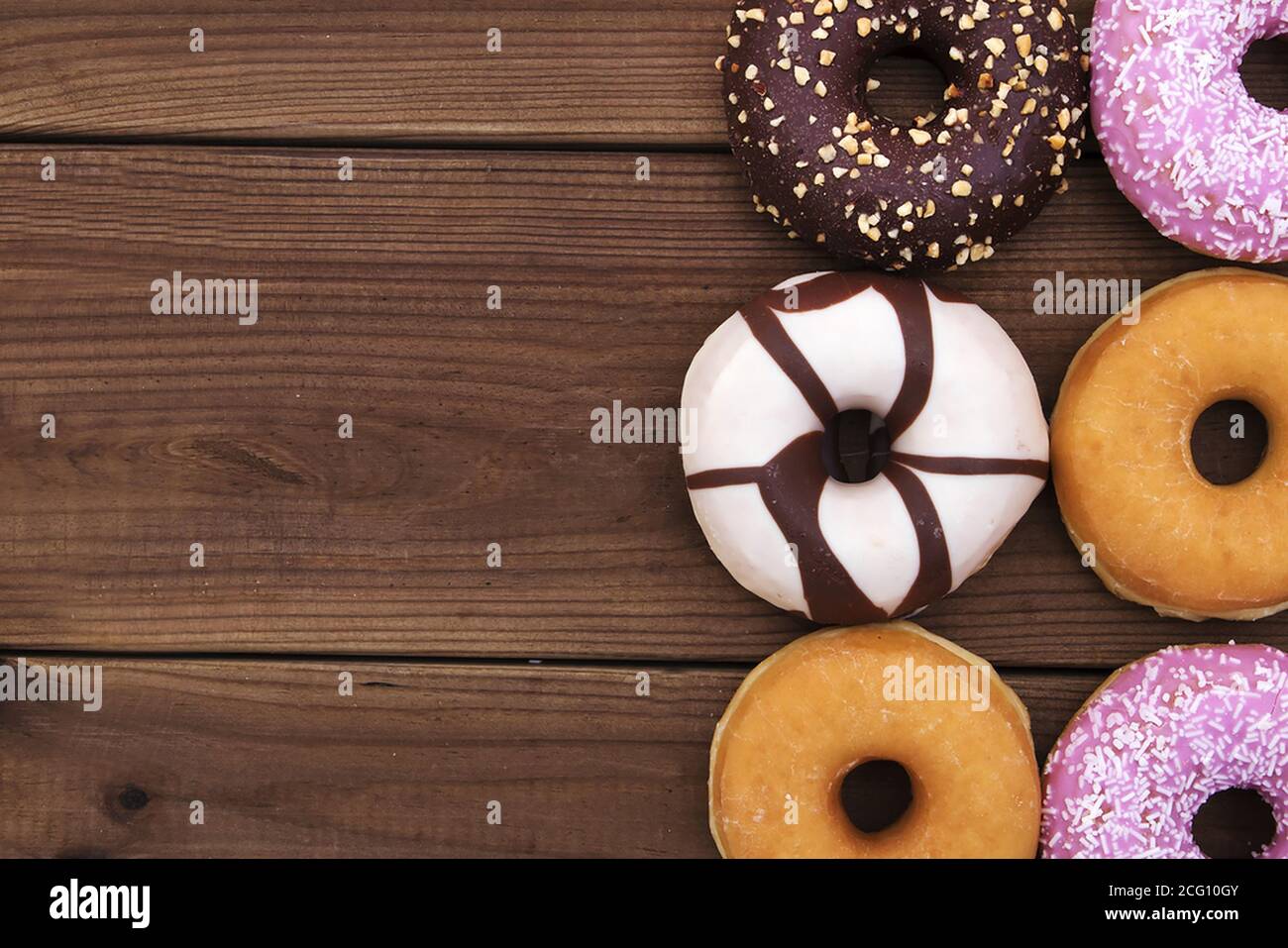 donuts and Bagels on antique wood Stock Photo Alamy