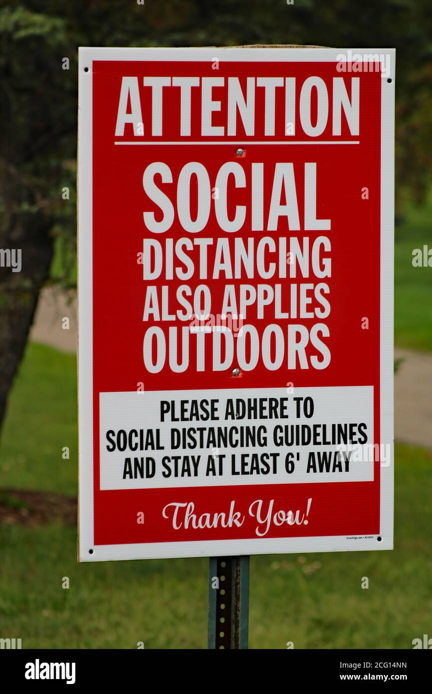 Social Distancing Sign. Outdoor social distancing executive order by Governor Gretchen Whitmer in Michigan. Stock Photo
