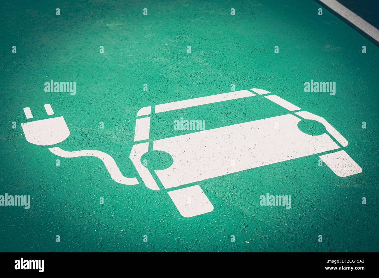 Parking symbol on the street for electric cars being charged Stock Photo