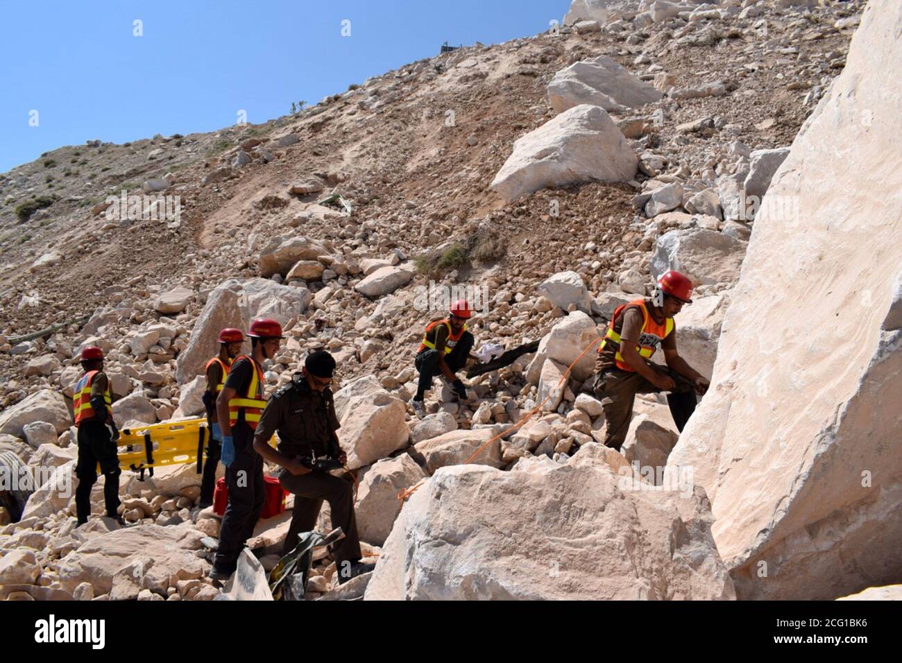Mohmand, Pakistan. 8th Sep, 2020. Rescuers search for miners after a rock slide at a marble mine in Pakistan's northwest tribal district of Mohmand, on Sept. 8, 2020. The death toll from the rock slide incident at a marble mine, which took place on Monday in Pakistan's northwest tribal district of Mohmand, climbed to 19, police and local media said on Tuesday. Credit: Str/Xinhua/Alamy Live News Stock Photo
