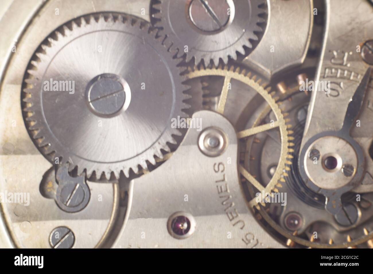 Old clock with machinery in sight Stock Photo Alamy