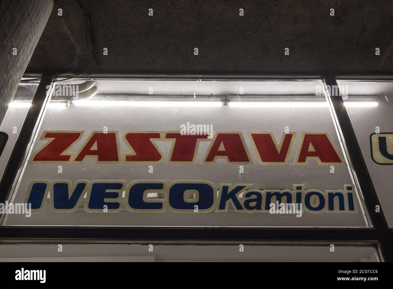 BELGRADE, SERBIA - SEPTEMBER 23, 2018: Logos of Iveco Kamioni and Zastava on their retailer for Belgrade center. Zastava automobiles was a Serbian and Stock Photo
