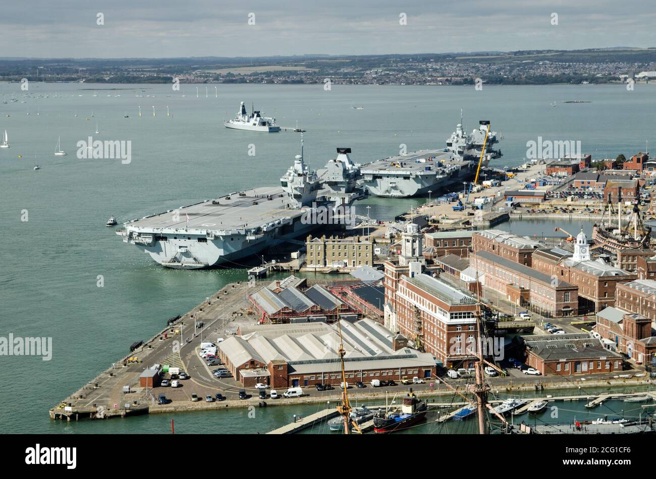 Aerial view of the two largest ships in the Royal Navy, the aircraft carriers Queen Elizabeth and the Prince of Wales moored beside each other in Port Stock Photo