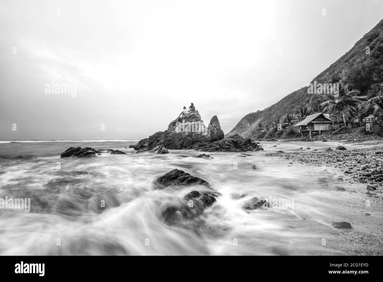 Waves Movement Around Rocks, Baler, Philippines Stock Photo