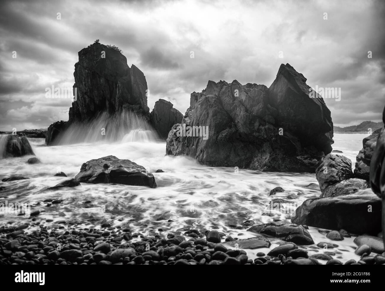 Crashing Waves Against Big Rocks Stock Photo