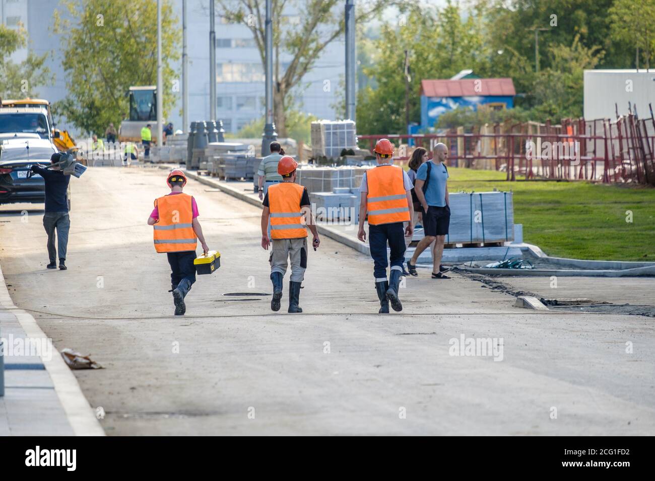 Construction workers wearing orange hi-res stock photography and images ...