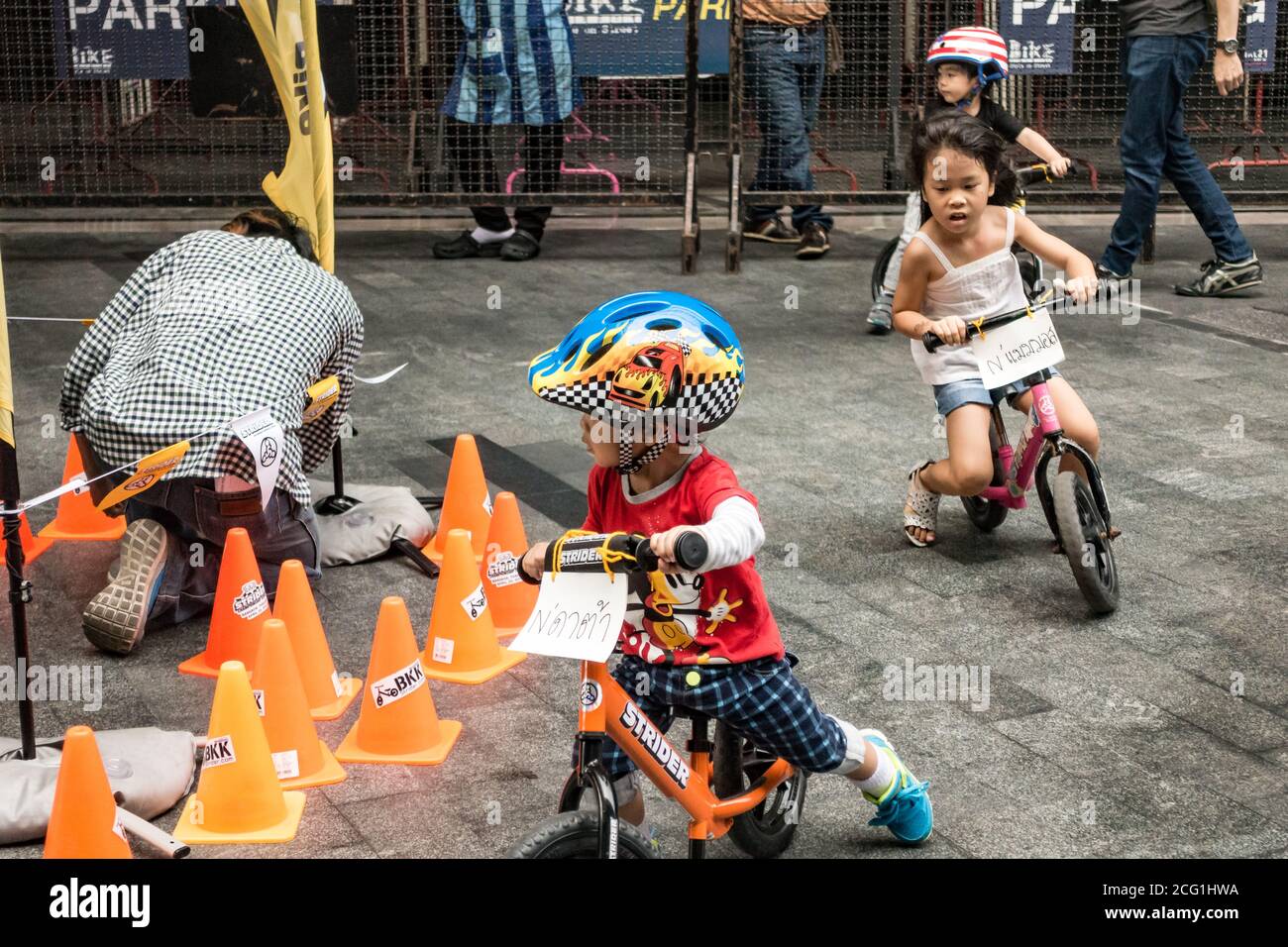 BANGKOK, THAILAND - JANUARY 14, 2016 : Children race bicycles on course. Stock Photo
