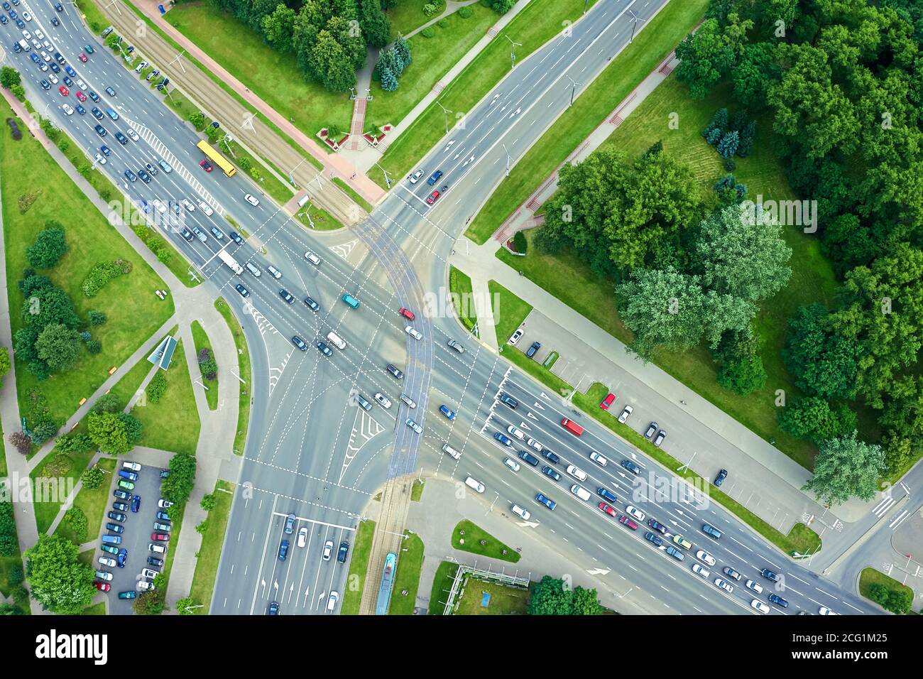 rush-hour on city streets at summer day. road intersection. aerial top view Stock Photo