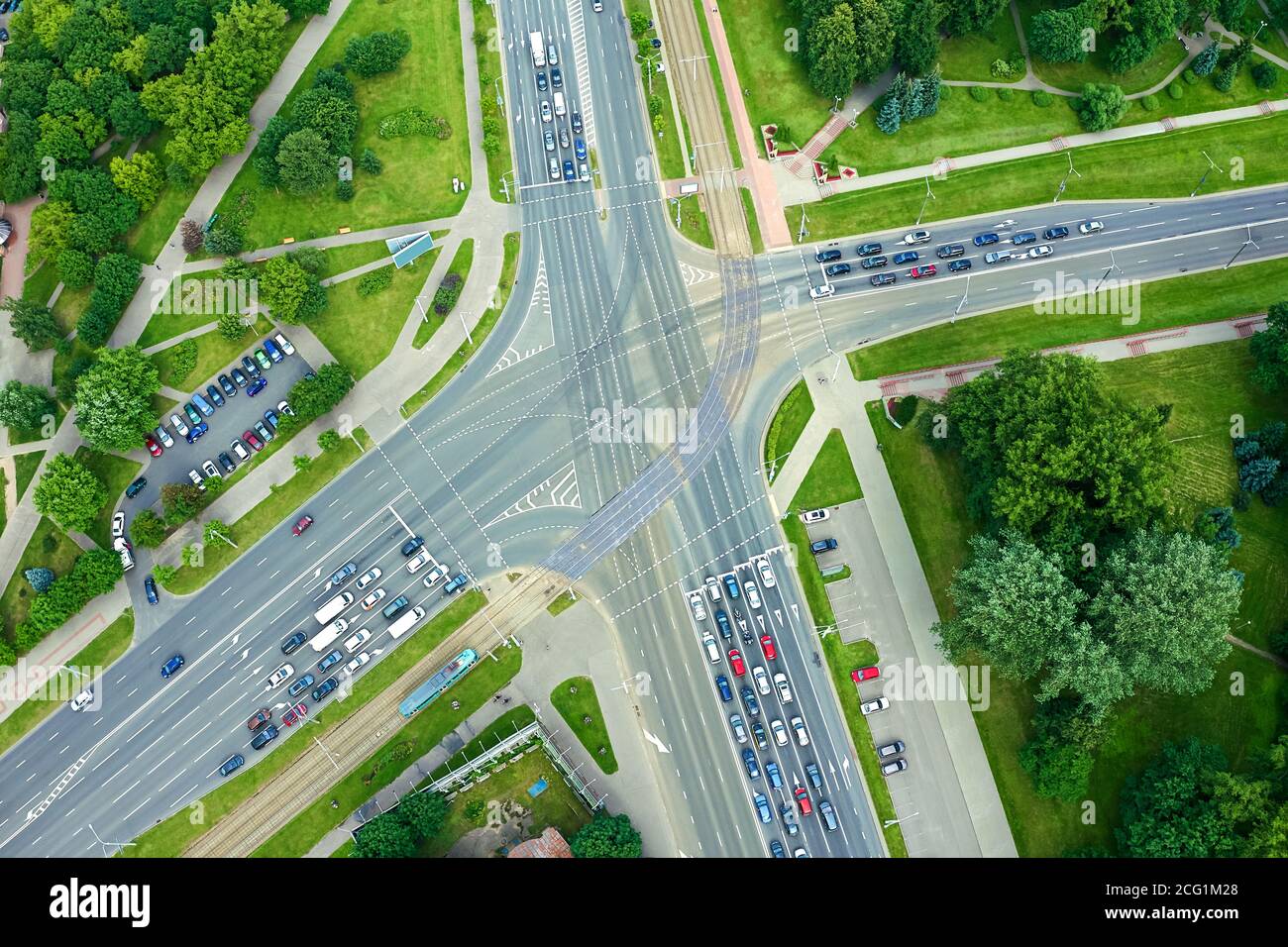 aerial top view of a crossroad junction in city with stoped cars Stock Photo
