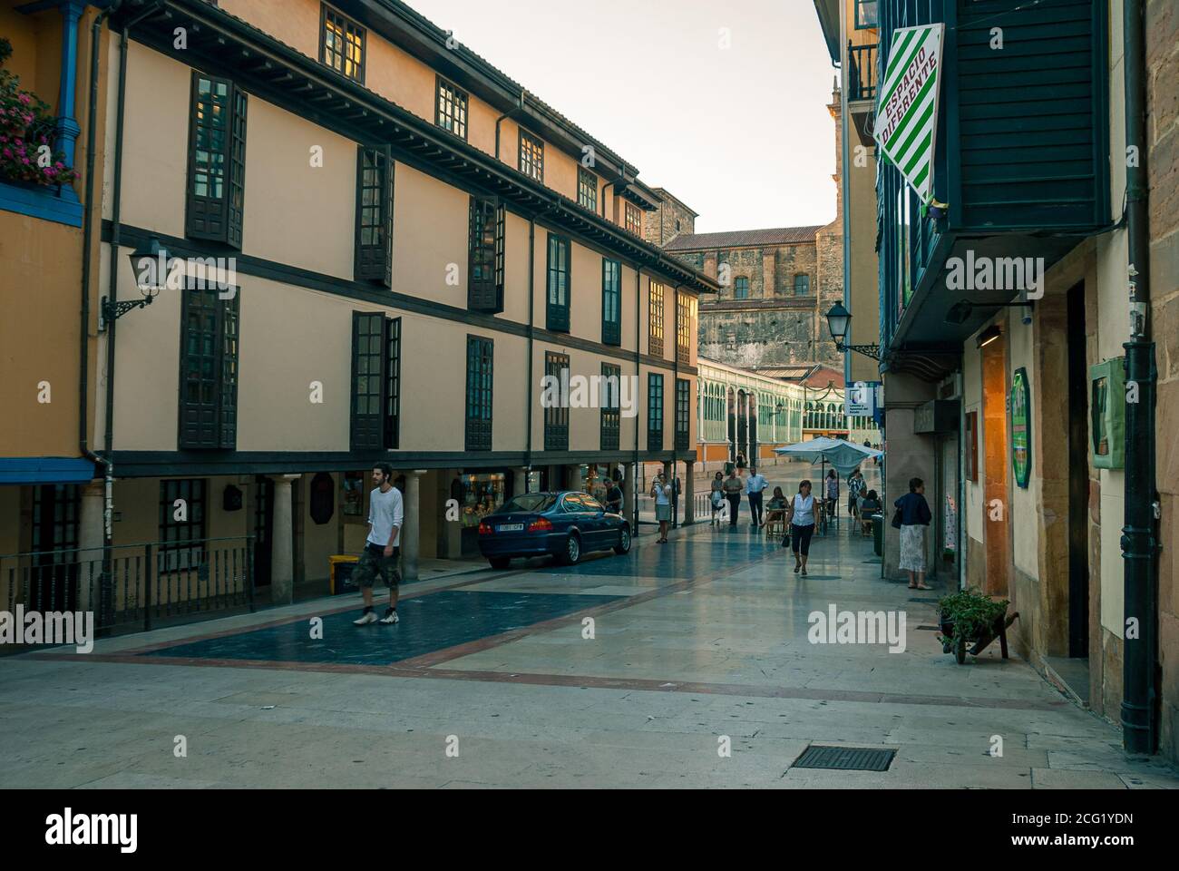 Spain August 2010. People walking through the city of Oviedo..- Stock Photo