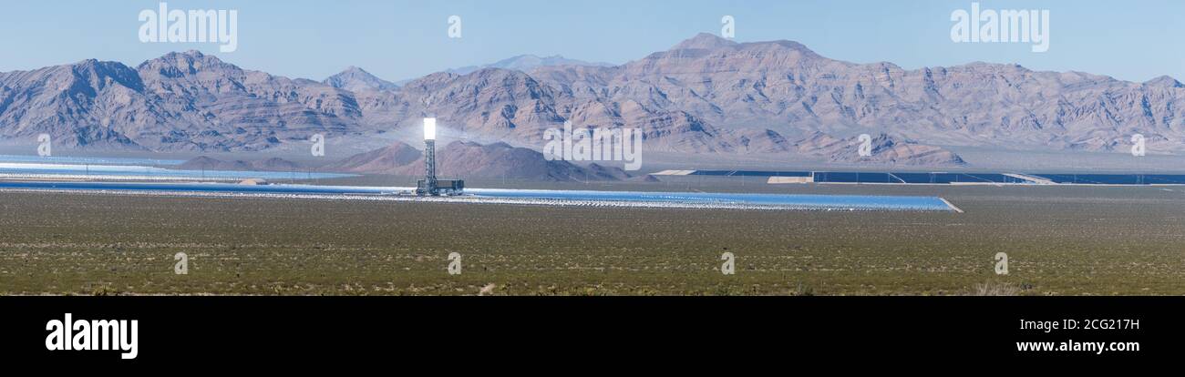 The Ivanpah Solar Power Facility, a concentrated solar thermal plant in the Mojave Desert near Ivanpah, California and Primm, Nevada, is one of the l Stock Photo