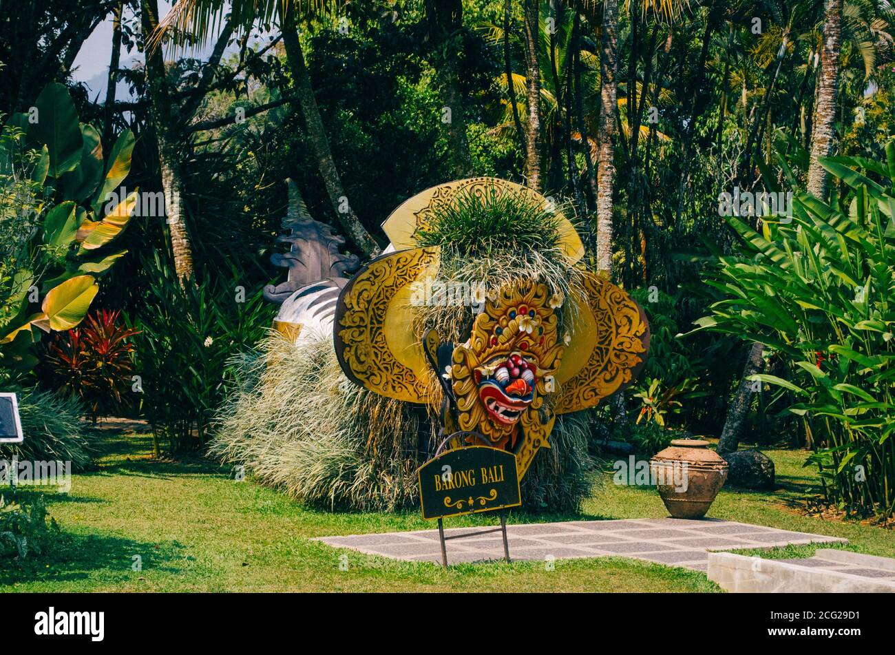 Bogor, Indonesia - A view of the flower-themed park Taman Bunga Nusantara in an afternoon with a view to a mythical Balinese god shaped like a dragon. Stock Photo