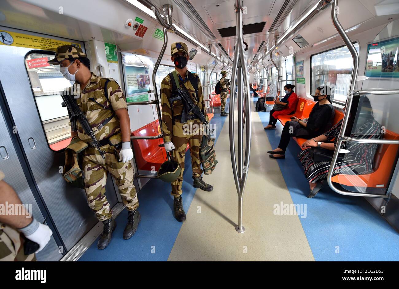 New Delhi, India. 9th September, 2020. Blue and Pink lines of Delhi Metro rail resume services after COVID-19 lockdown. Delhi Metro Commuters and Security persons travel in a metro train after Delhi Metro resumed services with curtailed operation of the Blue line and Pink line Metro, amid the ongoing corona virus pandemic, in New Delhi. India's corona virus cases are now the second-highest in the world and only behind the United States. Credit: PRASOU/Alamy Live News Stock Photo