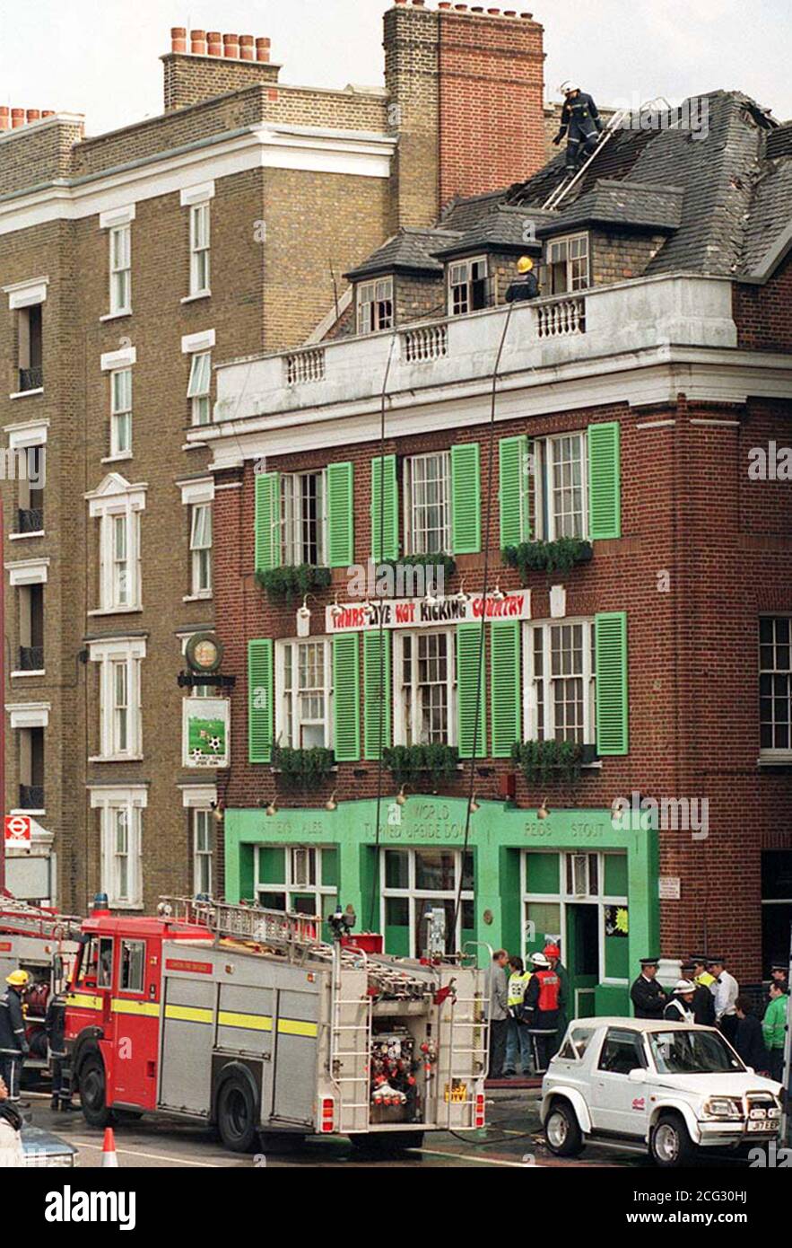 PAP 5. 18/6/85. LONDON. Firemen attend the scene at 'The World Turned