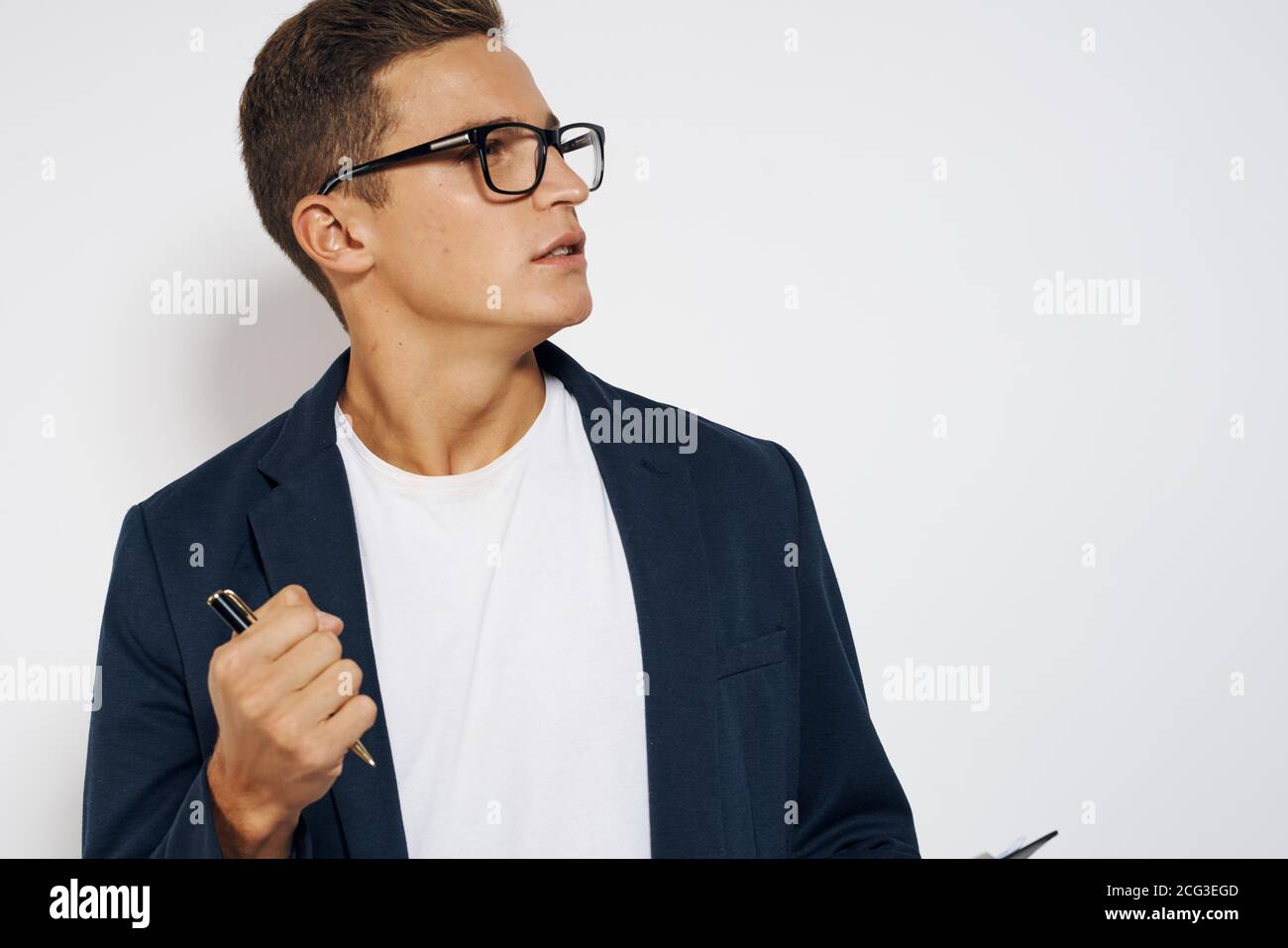 business guy with documents finance light background glasses jacket and  white t-shirt Stock Photo - Alamy