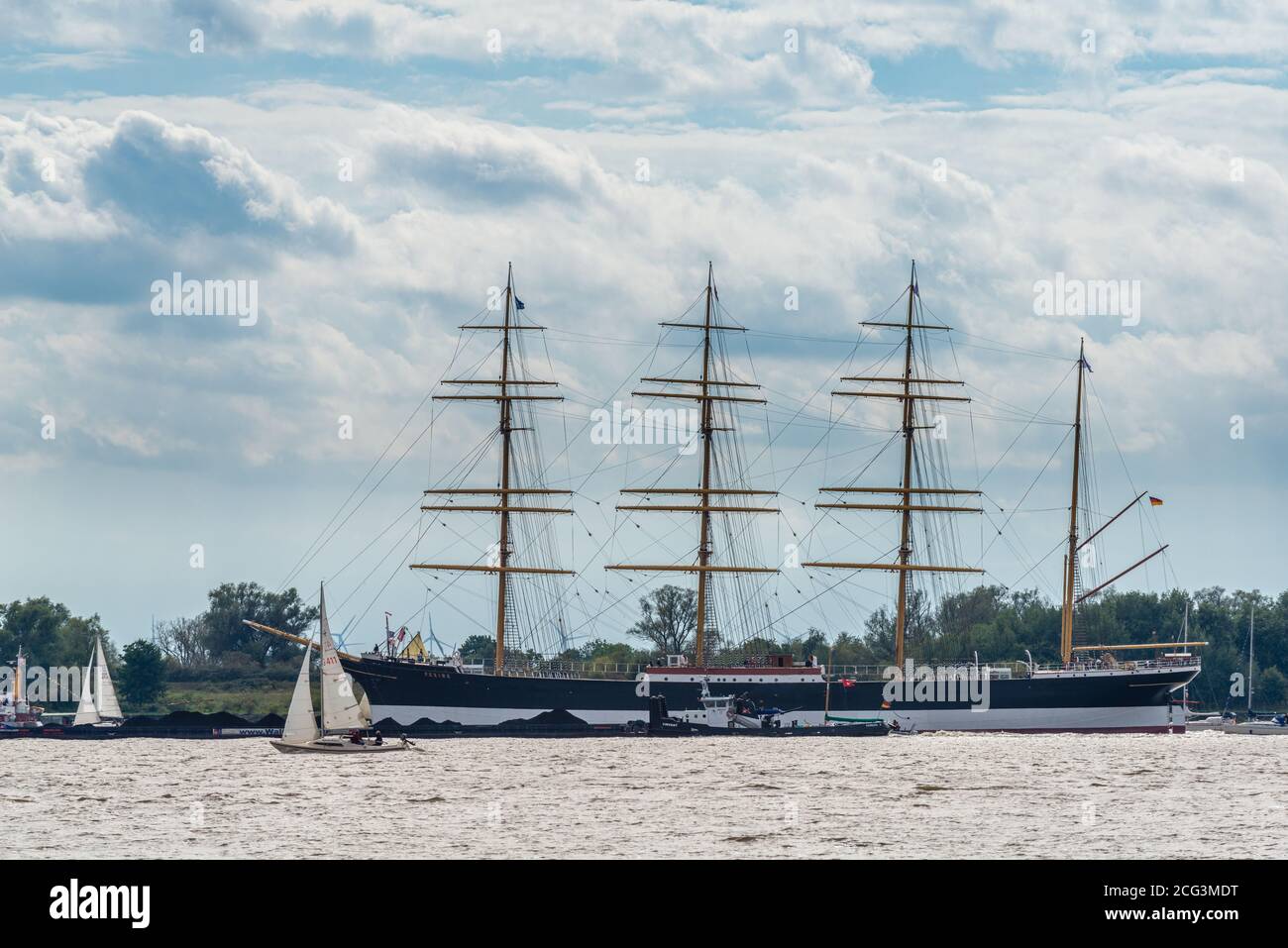 Newly renovated four-masted bark Peking, a former Flying-P-Liner being towed to Hamburg on the Elbe River, Lühesand, Lower Saxony, Germany Stock Photo
