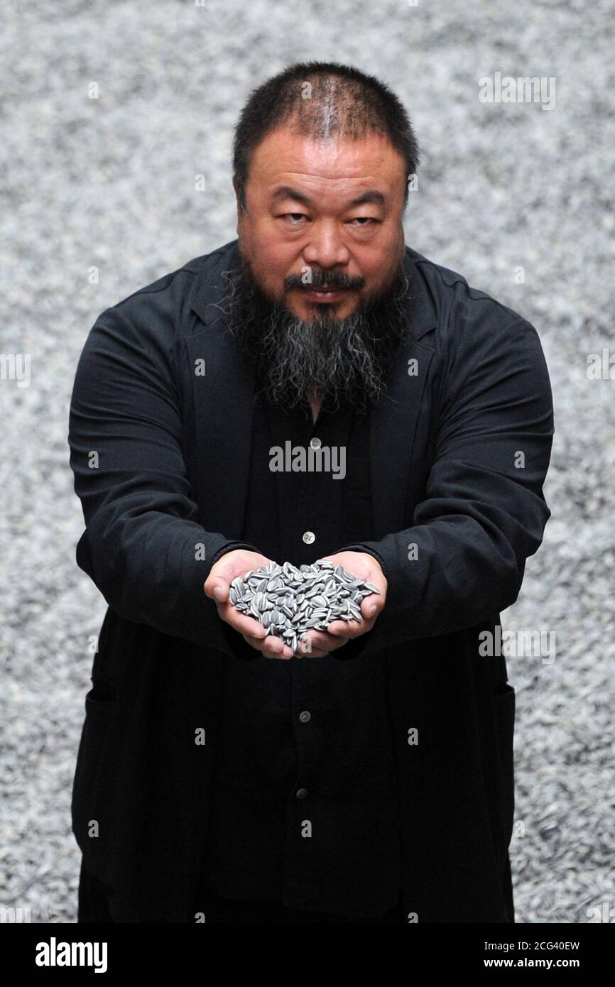 Chinese artist Ai Weiwei with his work 'Sunflower Seeds', the latest