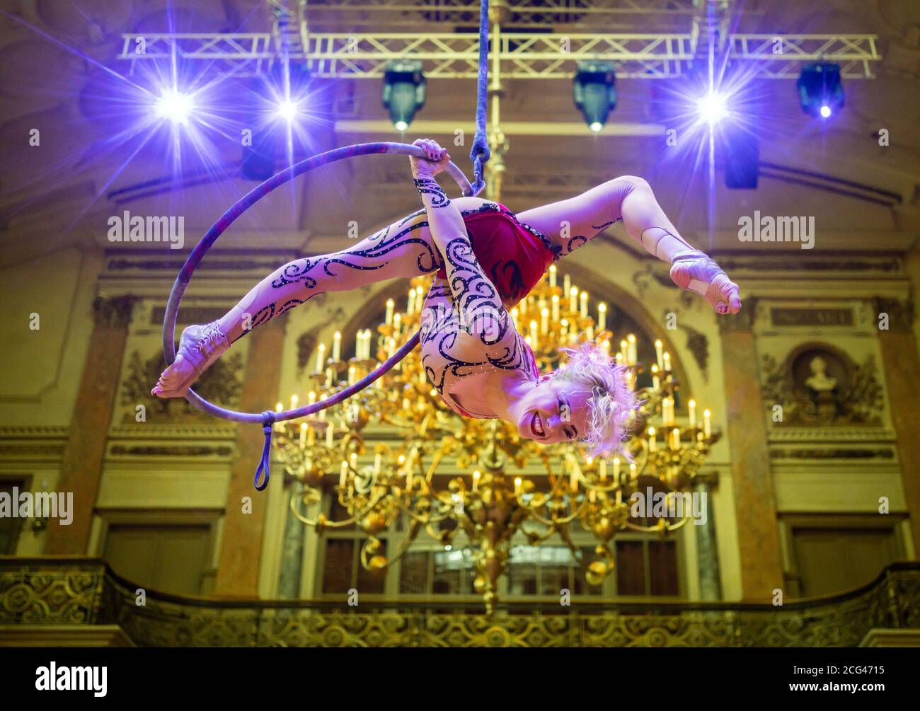 Frankfurt, Germany. 9th Sep 2020.  The artist Alyona Pavlova demonstrates her skills in the Gesellschaftshaus of the Frankfurt Palmengarten in a ring hanging from the ceiling. At a press conference, the Tigerpalast Varieté Theater presented its plans for this year's international Christmas revue and the accompanying hygiene concept. The Christmas Variety Theatre is to be held from 20.11.20 to 17.01.21 for up to 250 people. Credit: dpa picture alliance/Alamy Live News Stock Photo