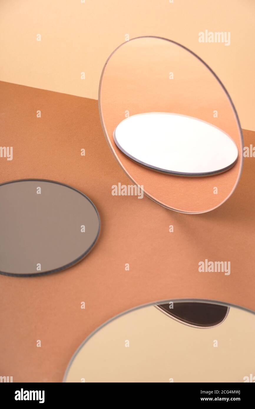 Abstract shapes with round mirrors in neutral colors Stock Photo - Alamy