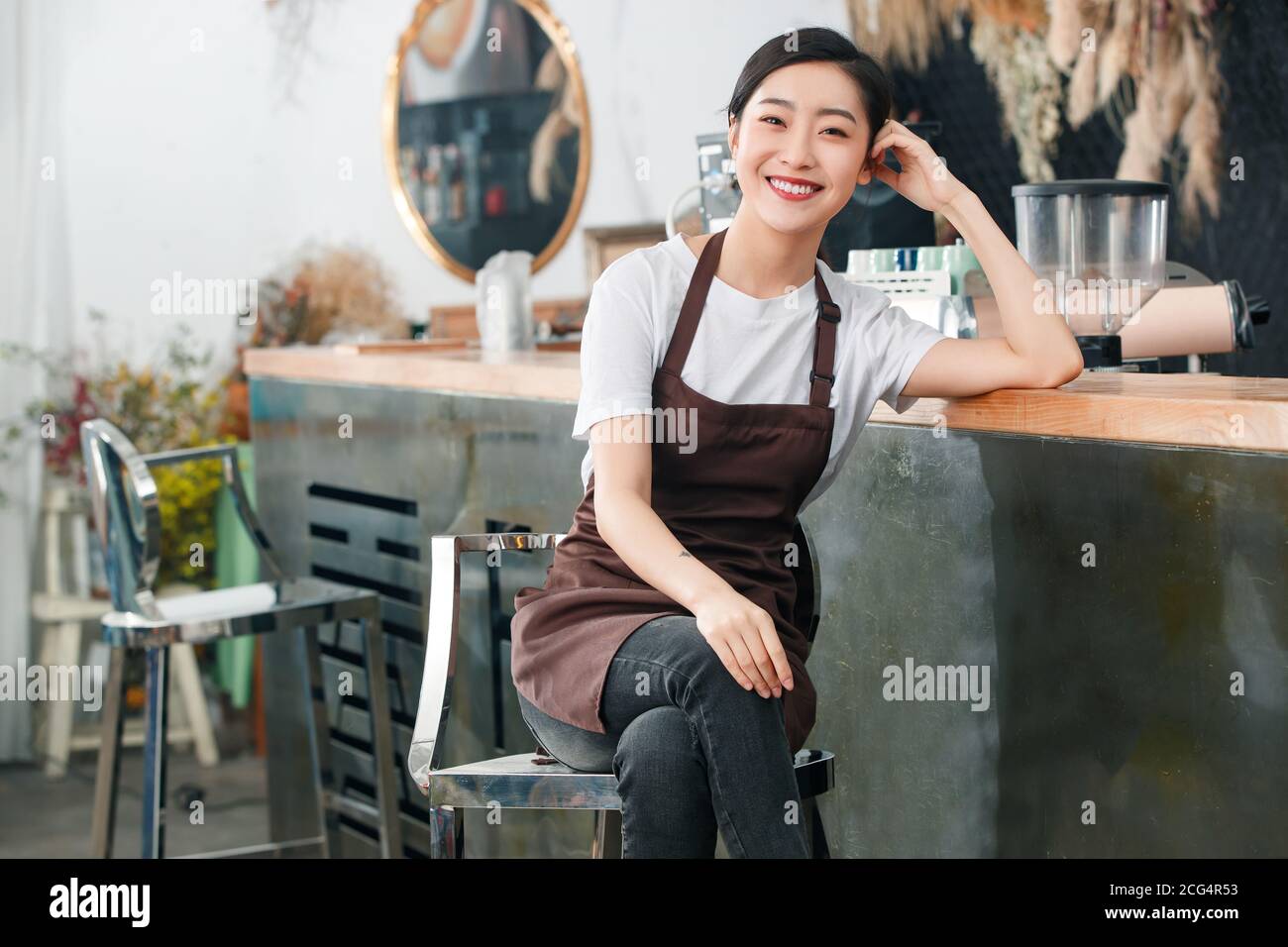 Coffee shop attendant to rest Stock Photo