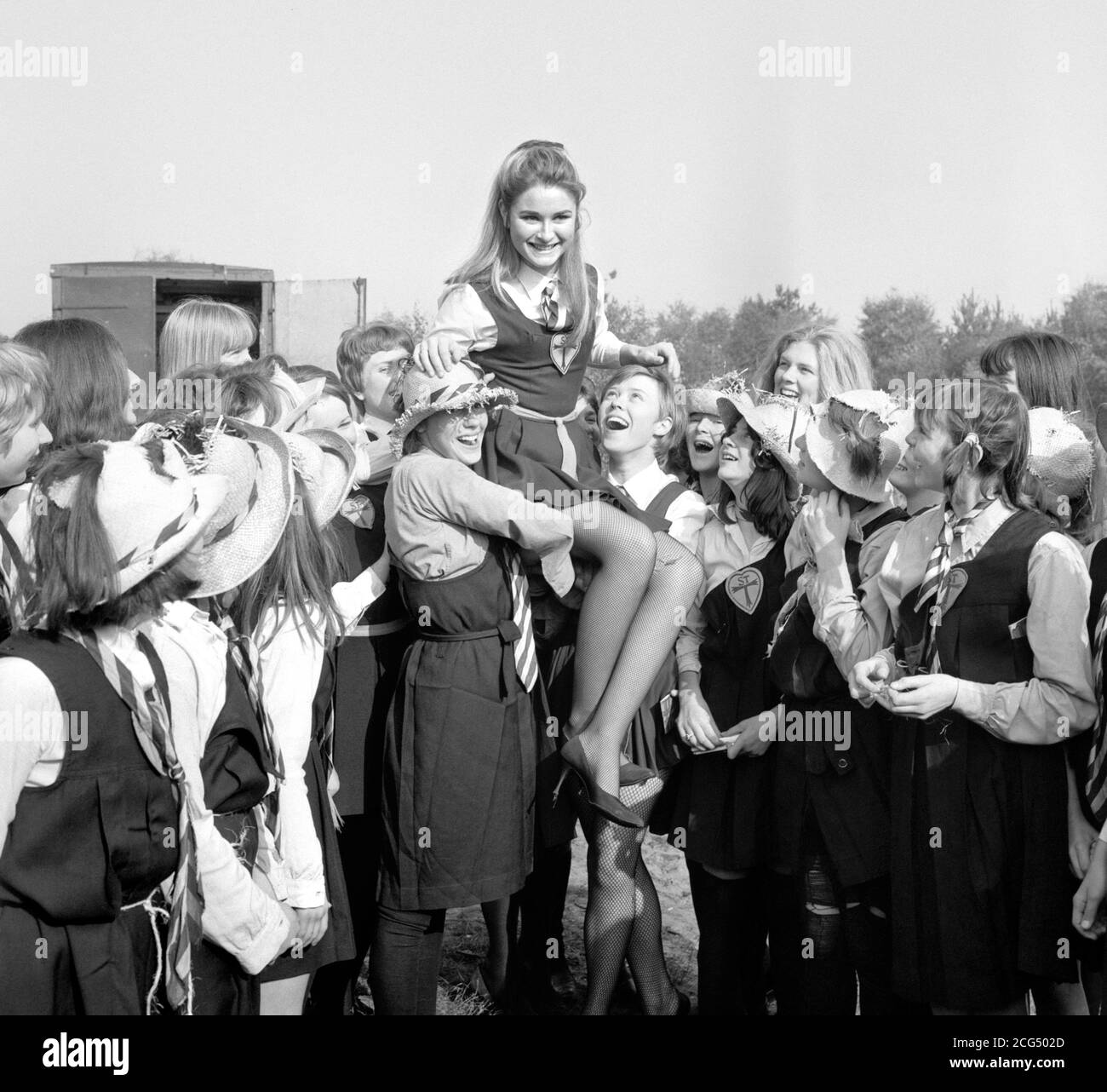 Portland Mason, daughter of film actor James Mason, during location filming at Longmoor Army Camp, Hampshire, for 'The Great St Trinian's Train Robbery', based on the dreadful girls school created in the books by the renowned cartoonist, Ronald Searle. Stock Photo