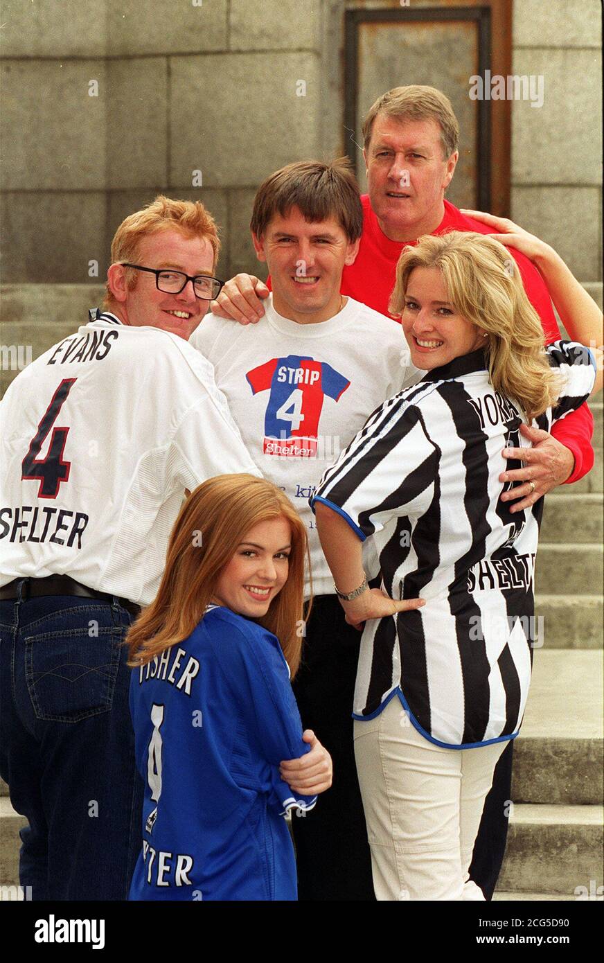 Former England soccer stars Peter Beardsley (centre) and Sir Geoff Hurst with TV sports presenter Gabby Yorath (right) and Virgin radio boss Chris Evans (left) and actress Isla Fisher, during a photocall at the FA Premier League Hall of Fame in London. * to launch Strip 4 Shelter, a new fundraising day for Shelter, the UK's largest national charity working on behalf on the homeless. On Strip 4 Shelter day, which takes place on Friday 24 September, men and women all over the country will be able to join in the fun by contributing 2 (50p for school children) to wear their favourite team's Stock Photo