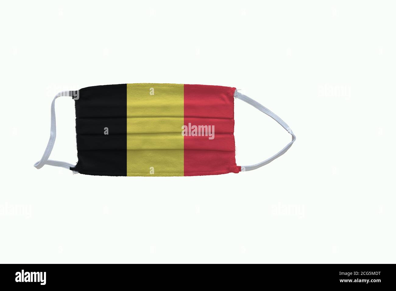 Belgian flag design Covid-19 pandemic  virus face mask  on a white background with copy space Stock Photo