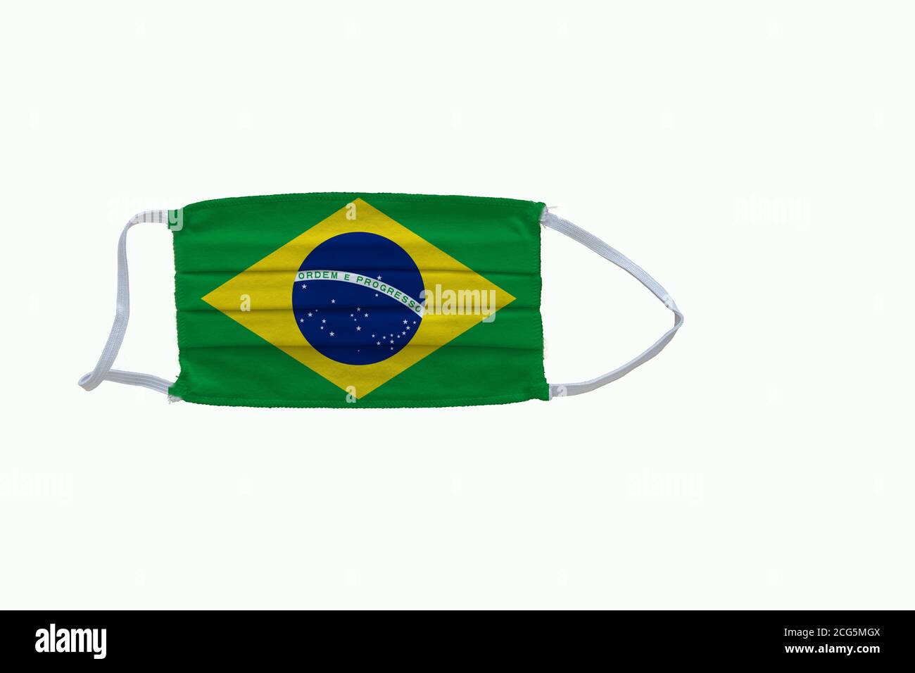 Brazilian flag design Covid-19 pandemic  virus face mask  on a white background with copy space Stock Photo