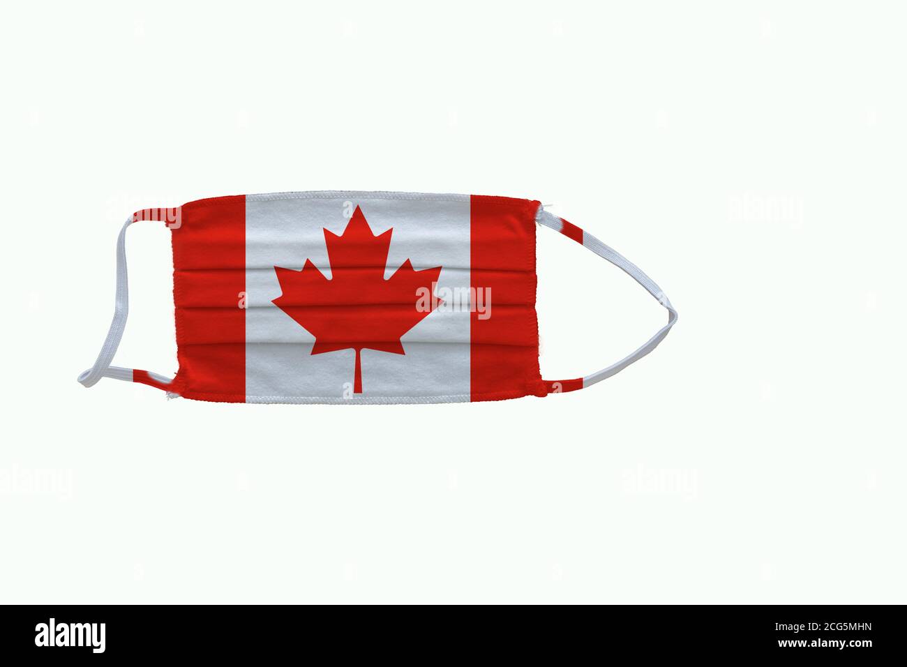 Canadian flag design Covid-19 pandemic  virus face mask  on a white background with copy space Stock Photo