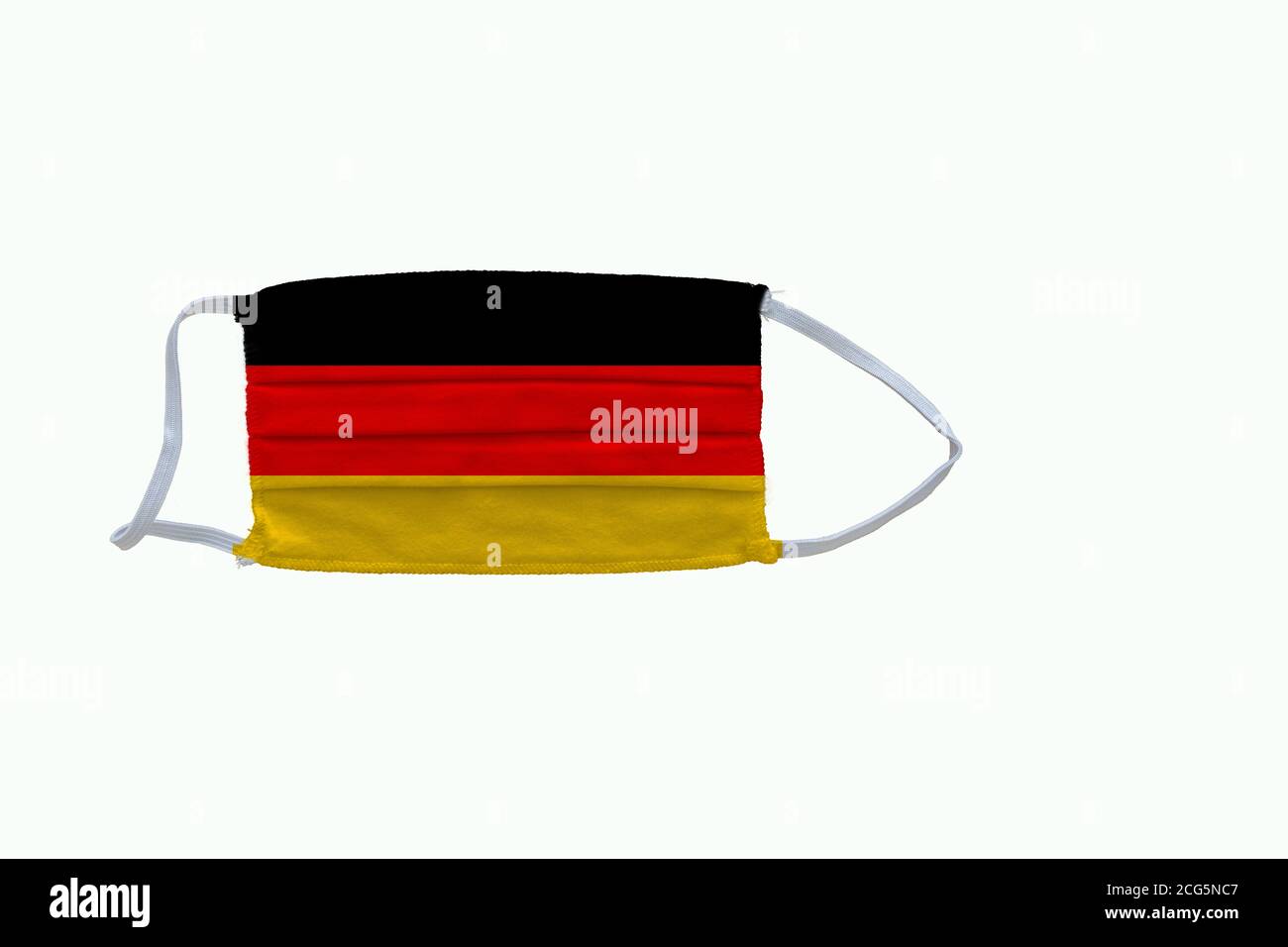 German flag design Covid-19 pandemic  virus face mask  on a white background with copy space Stock Photo