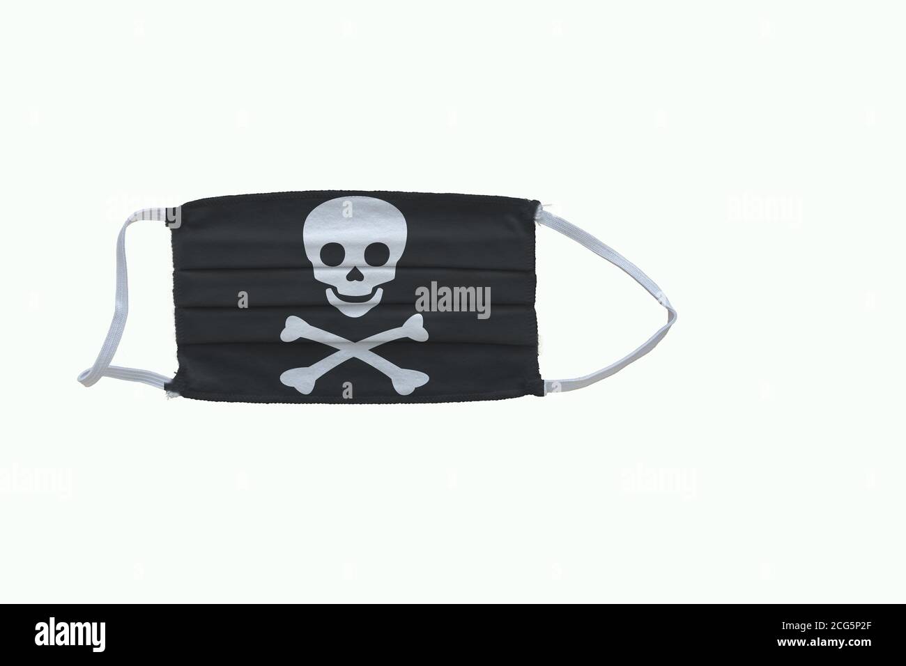 Jolly Roger flag design Covid-19 pandemic  virus face mask  on a white background with copy space Stock Photo