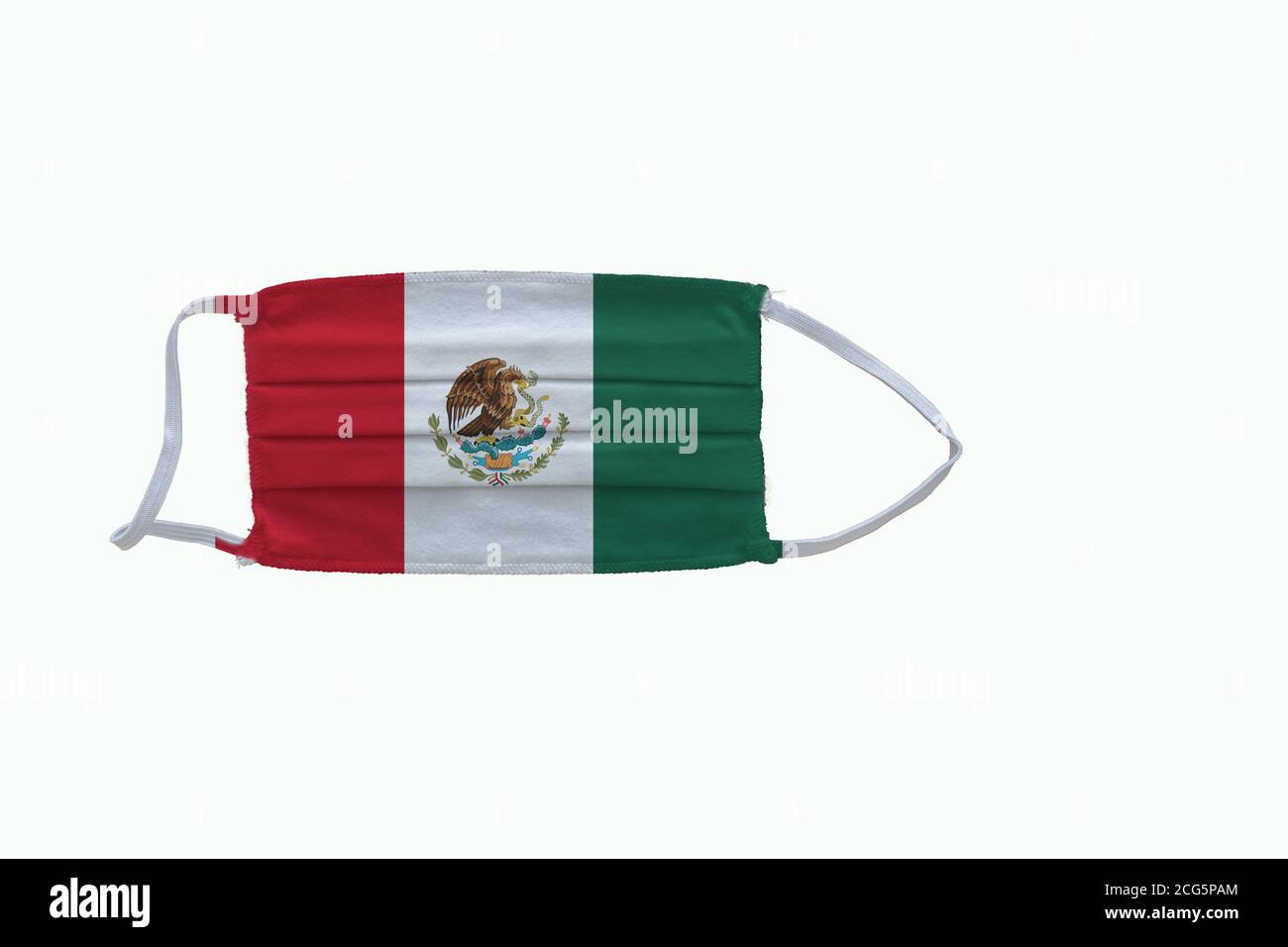 Mexican flag design Covid-19 pandemic  virus face mask  on a white background with copy space Stock Photo