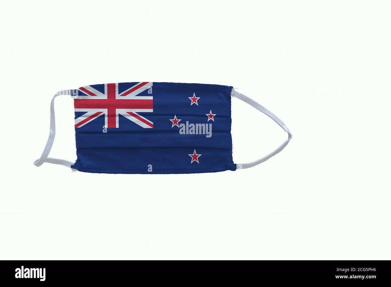 New Zealand  flag design Covid-19 pandemic  virus face mask  on a white background with copy space Stock Photo