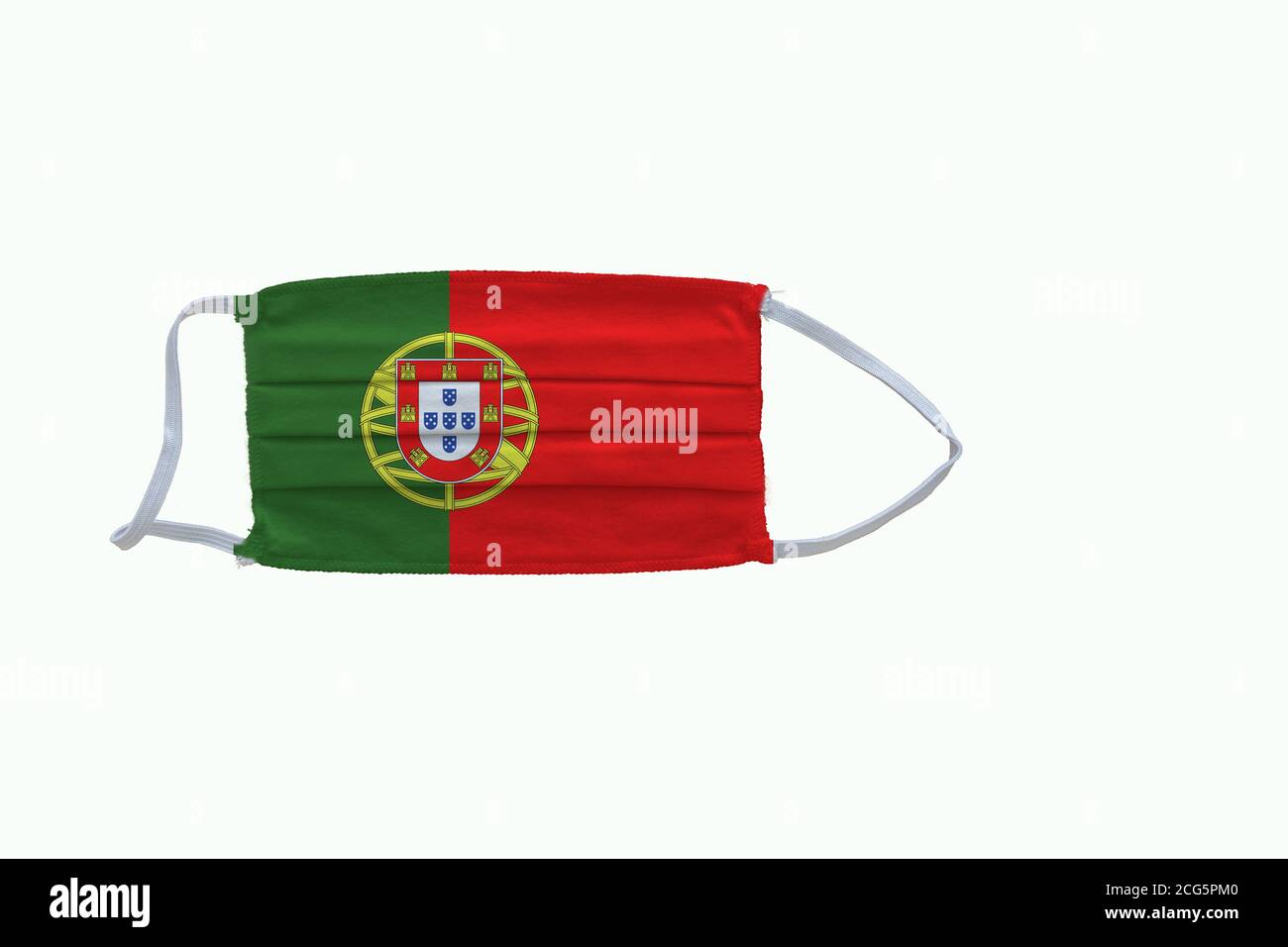 Portuguese  flag design Covid-19 pandemic  virus face mask  on a white background with copy space Stock Photo