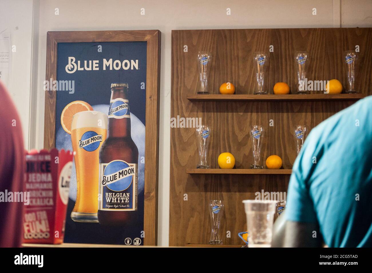 BELGRADE, SERBIA - AUGUST 26, 2020: Blue Moon Beer logo in a bar in Belgrade. Blue Moon is a belgian style wheat beer produced in Colorado owned by Mi Stock Photo
