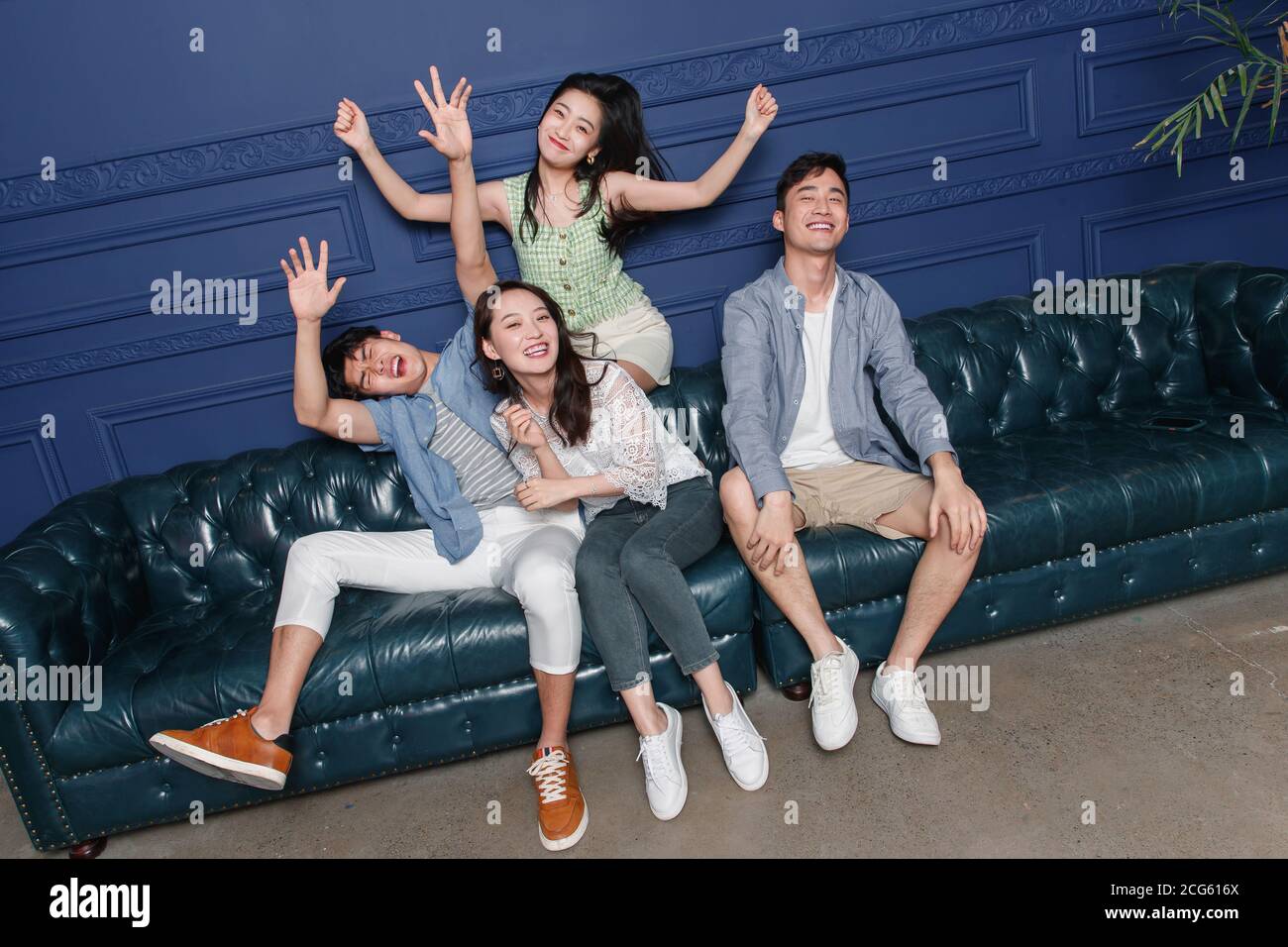 Indian young friends sitting sofa hi-res stock photography and images ...