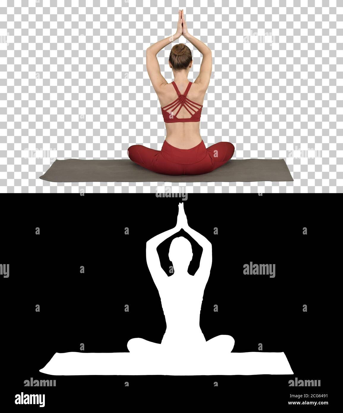Young sporty woman sitting in lotus pose, join hands above her head ...