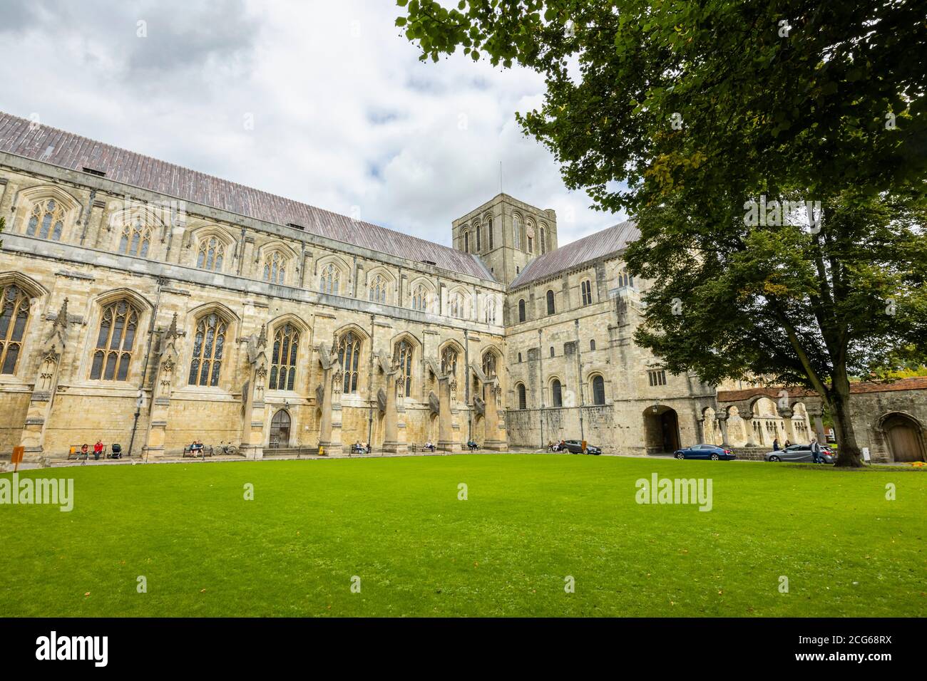 Flying buttresses and stonework on the south side of the exterior of Winchester Cathedral in Winchester, Hampshire, south England Stock Photo