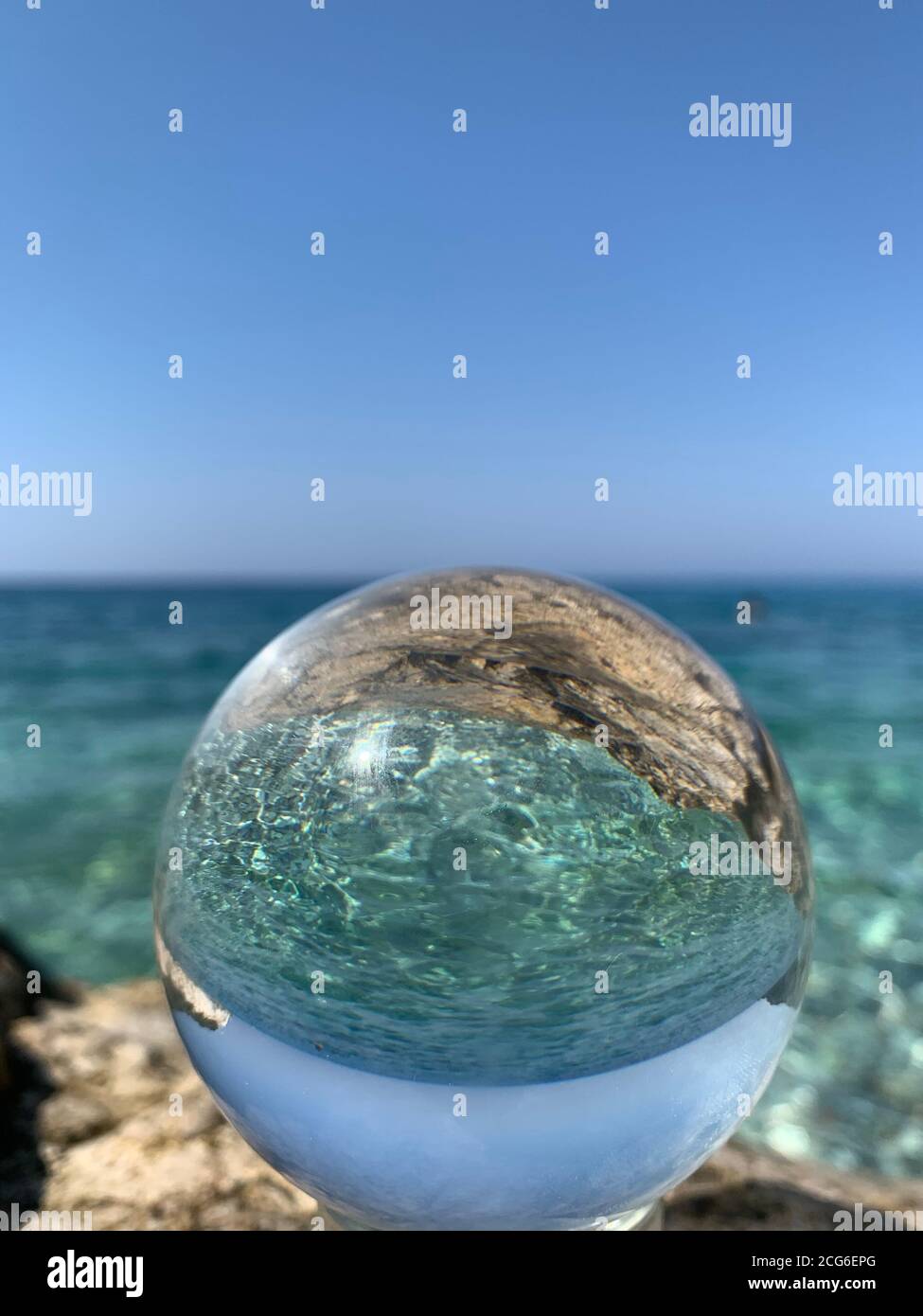 close up crystal glass ball at the beach Stock Photo Alamy